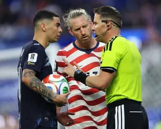 Paraguay’s Miguel Almiron and the USMNT’s Tim Ream speak to referee Danny Makkelie in the second half of Friday’s match.