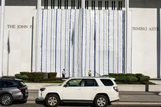 Reuters Long white and blue plastic sheeting over the Kennedy Center