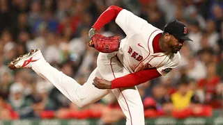 Boston Red Sox relief pitcher Aroldis Chapman pitching during a game at Fenway Park.
