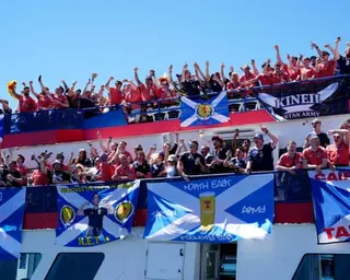 Scotland fans on board a boat cruise from Boston Harbour, before the game against Haiti