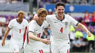 Declan Rice and Anthony Gordon celebrate