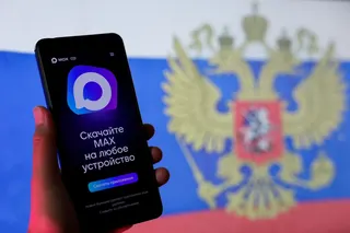The Russian messaging app MAX is displayed on a smartphone next to a screen showing the state flag of Russia in this illustration taken September 4, 2025. — Reuters file pic