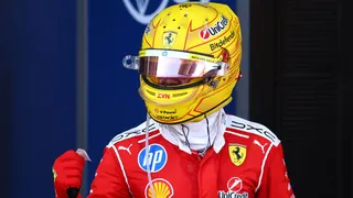 Ferrari's Lewis Hamilton clenches his fist in celebration after winning the Barcelona-Catalunya Grand Prix