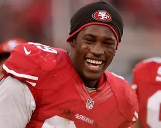 Aldon Smith smiles during an NFL game in 2012.
