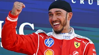 Lewis Hamilton clenches his right fist in celebration after winning the Barcelona-Catalunya Grand Prix