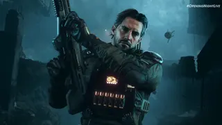 A black ops guy holds up a gun.