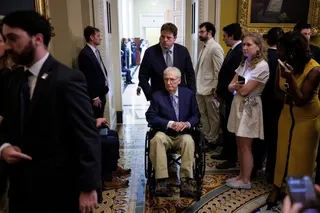 US Senator Mitch McConnell in a wheelchair following a weekly policy lunch on Capitol Hill in Washington on May 19. McConnell was taken to hospital on Sunday. Photo: Reuters