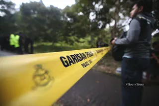 Two persons, including a teenager with a learning disability who had been reported missing since last Friday, were found drowned in Sungai Kedah here today. - File pic