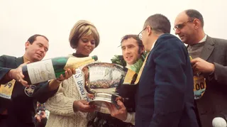 Jackie Stewart receiving the trophy for winning the US Grand Prix.