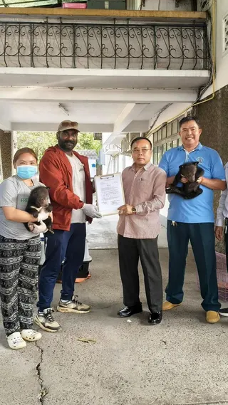Karthiriish (second from left) has helped rescue 30 bears since joining Free the Bears.