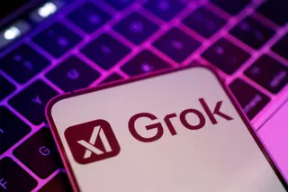 Grok and xAI logos on a smartphone. Photo: Reuters
