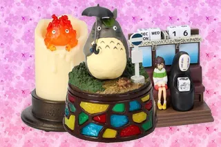 A collage of Studio Ghibli merchandise items against a pink background