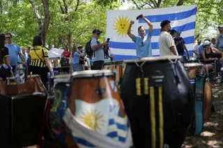 Uruguay fans gather in Miami Tropical Park on Sunday