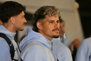 Uruguay's midfielder #20 Maximiliano Araujo looks toward fans as the Uruguayan national football team arrives at Carrasco International Airport ahead of its departure to Mexico for the FIFA 2026 World Cup football tournament, in Ciudad de la Costa, Canelones department, Uruguay, on June 9, 2026. (Photo by Santiago Mazzarovich / AFP)