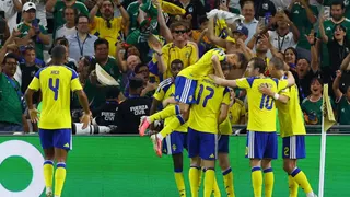Sweden's Viktor Gyökeres celebrates scoring their third goal with teammates.