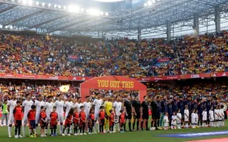 The Iraq (left) and Spain teams line up for the national anthems ahead of their pre-World Cup friendly in Spain.