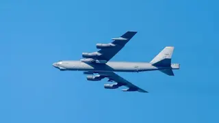 Getty Images A US B-52 Stratofortress bomber seen in the skies above the UK in March