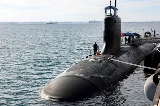 US Navy officers stand aboard the Virginia-class fast-attack submarine USS Minnesota  docked at HMAS Stirling in Rockingham, Western Australia, on February 26, 2025, during a port visit. Photo: AFP