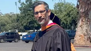 Sundar Pichai seen on the campus in a commencement gown