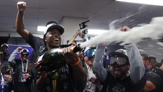 OG Anunoby celebrating on basketball court after NBA Finals win