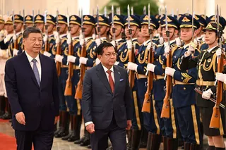 Chinese leader Xi Jinping (left) and Myanmar’s President Min Aung Hlaing inspect a guard of honour in Beijing on Tuesday. Photo: Myanmar Presidential Press and Information Bureau/AFP