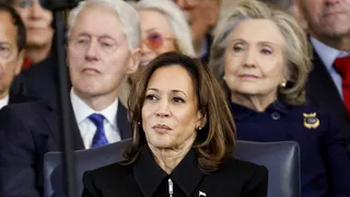 Former President Bill Clinton, former Vice President Kamala Harris, and former Secretary of State Hillary Clinton standing in the U.S. Capitol rotunda