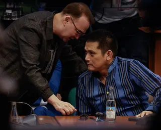 Senators Alan Peter Cayetano (left) and Robin Padilla chat during a Senate committee hearing into anomalous government flood control projects on June 4. Photo: EPA