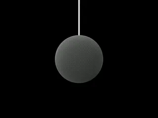 <em>The speaker has a round design, smaller than the Nest Audio, and bigger than the Mini.</em>