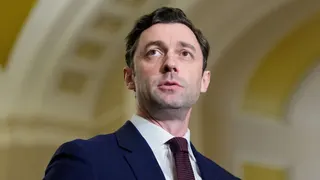 Senator Jon Ossoff speaking at a news conference at the U.S. Capitol
