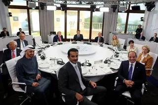 World leaders gather for a working lunch during the G7 summit on Tuesday. Photo: Reuters