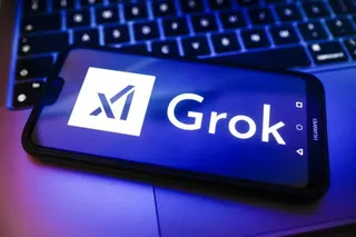xAI and Grok logos displayed on a smartphone screen