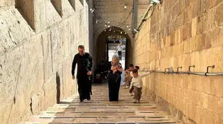 Palestinians arrive to celebrate the Islamic Hijri New Year at the Ibrahimi Mosque, known to Jews as the Cave of the Patriarchs, located inside the Israeli-controlled H2 sector of the occupied West Bank city of Hebron, on June 16, 2026.