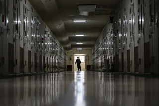 A staff member stands at the end of a corridor of a prison in Tokyo on February 22, 2024. Photo: AFP