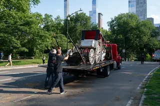 A damaged horse carriage being removed from Central Park after it overturned. Photo: TNS