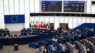 Aerial view showing members of the European parliament seated in the chamber