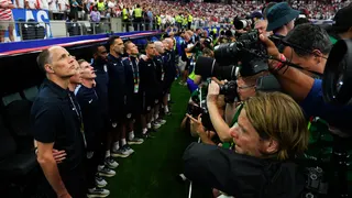 Thomas Tuchel is surrounded by cameramen