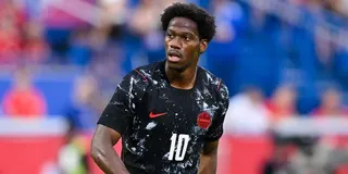 Jonathan David looks on during a match for Canada