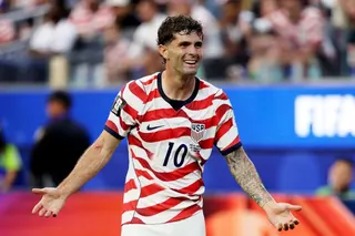 Chritain Pulisic smiles after helping the United States go ahead against Paraguay in opening Group D match.