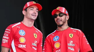 Charles Leclerc and Lewis Hamilton on stage at the fan zone in Barcelona