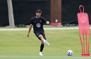 Christian Pulisic has had his left calf wrapped in a sleeve during training sessions.