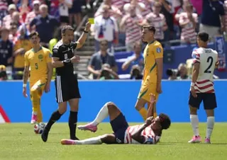 Jordy Bos is shown a yellow card.