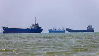 AFP via Getty Images In this picture obtained from Iran's ISNA news agency,  vessels are seen anchored in Bandar Abbas along the Strait of Hormuz.
