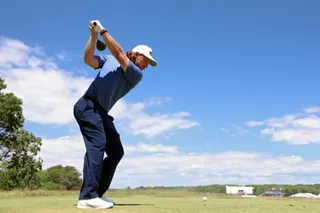Tommy Fleetwood plays his shot from the 3rd tee.