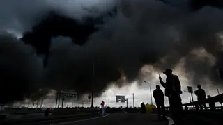 Anadolu via Getty Images Black smoke rises from the refinery where a fire broke out following a strike as firefighting efforts continue in Moscow, Russia on June 18, 2026