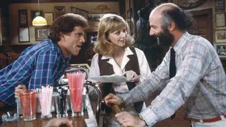 NBCU Photo Ban James Burrows, on the right, leans against the bar on the set of Cheers actors and smiles as he speaks with actors Ted Danson and Shelley Long