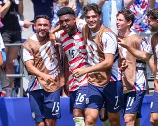 The US celebrate their second goal against Australia on Friday