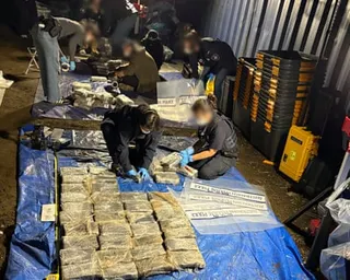 The AFP with the seized cocaine