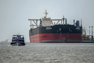 Indian-flagged oil tanker Kashimasan, docked near an offloading terminal at Butcher Island, near Mumbai, on April 1. Photo: AFP