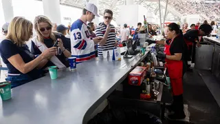 Fans buy snacks and beverages at a concession stand during the 2026 World Cup Group D football match between USA and Paraguay at the Los Angeles Stadium in Inglewood on June 12, 2026. (Photo by ETIENNE LAURENT / AFP via Getty Images)