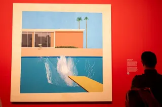 A visitor looks at the David Hockney painting entitled ‘A Bigger Splash 1967’ during the David Hockney 2025 exhibition at Paris April 12, 2025. — AFP pic